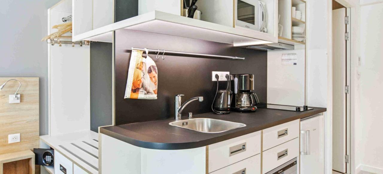 Estudio con 2 camas individuales