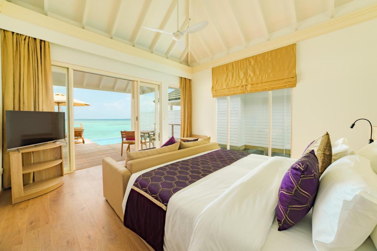 Lagoon Villa Pool + Slide - Free shared seaplane for 2 guests, minimum 7-night stay