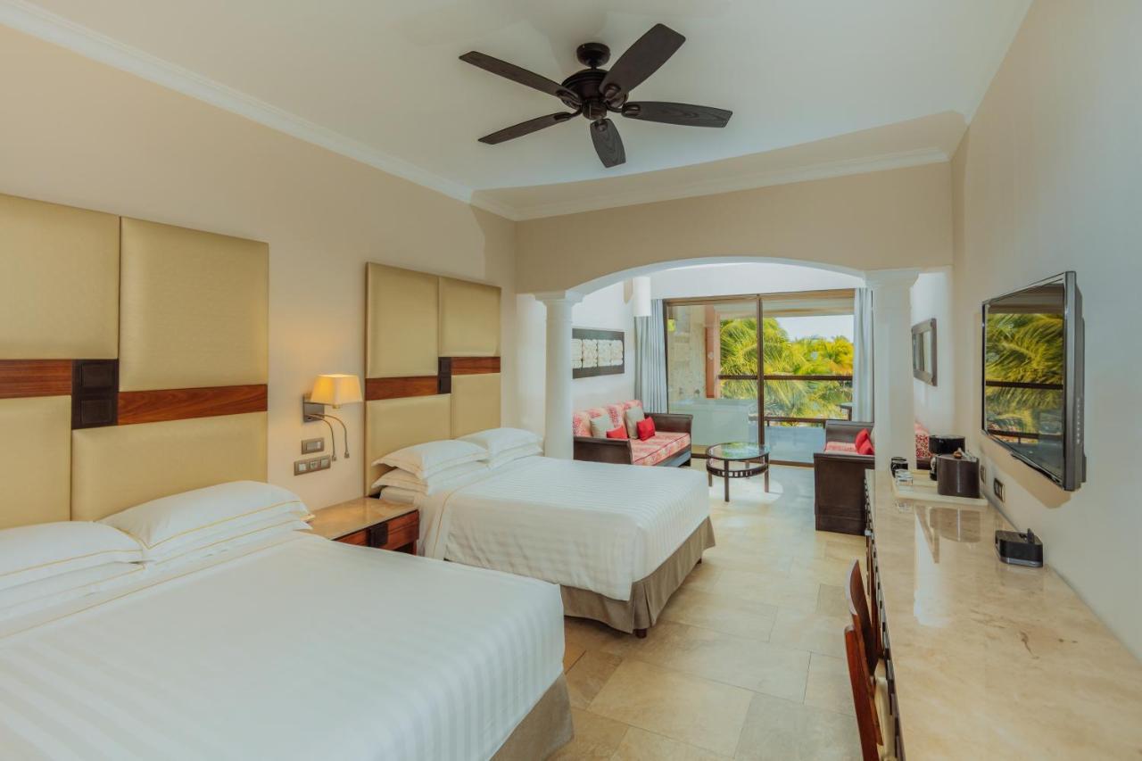 Suite Júnior Frente ao Oceano Nível Premium (1 Adulto + 1 Criança)