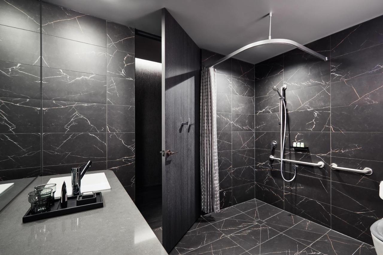 Cozy Accessible Accessible Guest room 1 King Roll Shower