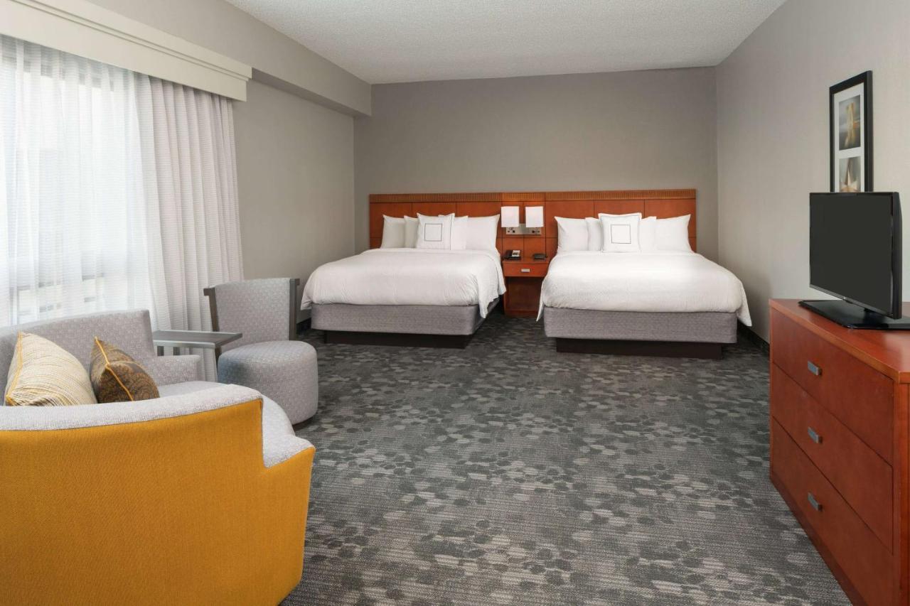 One-Bedroom Suite with Two Queens - Balcony Pool View