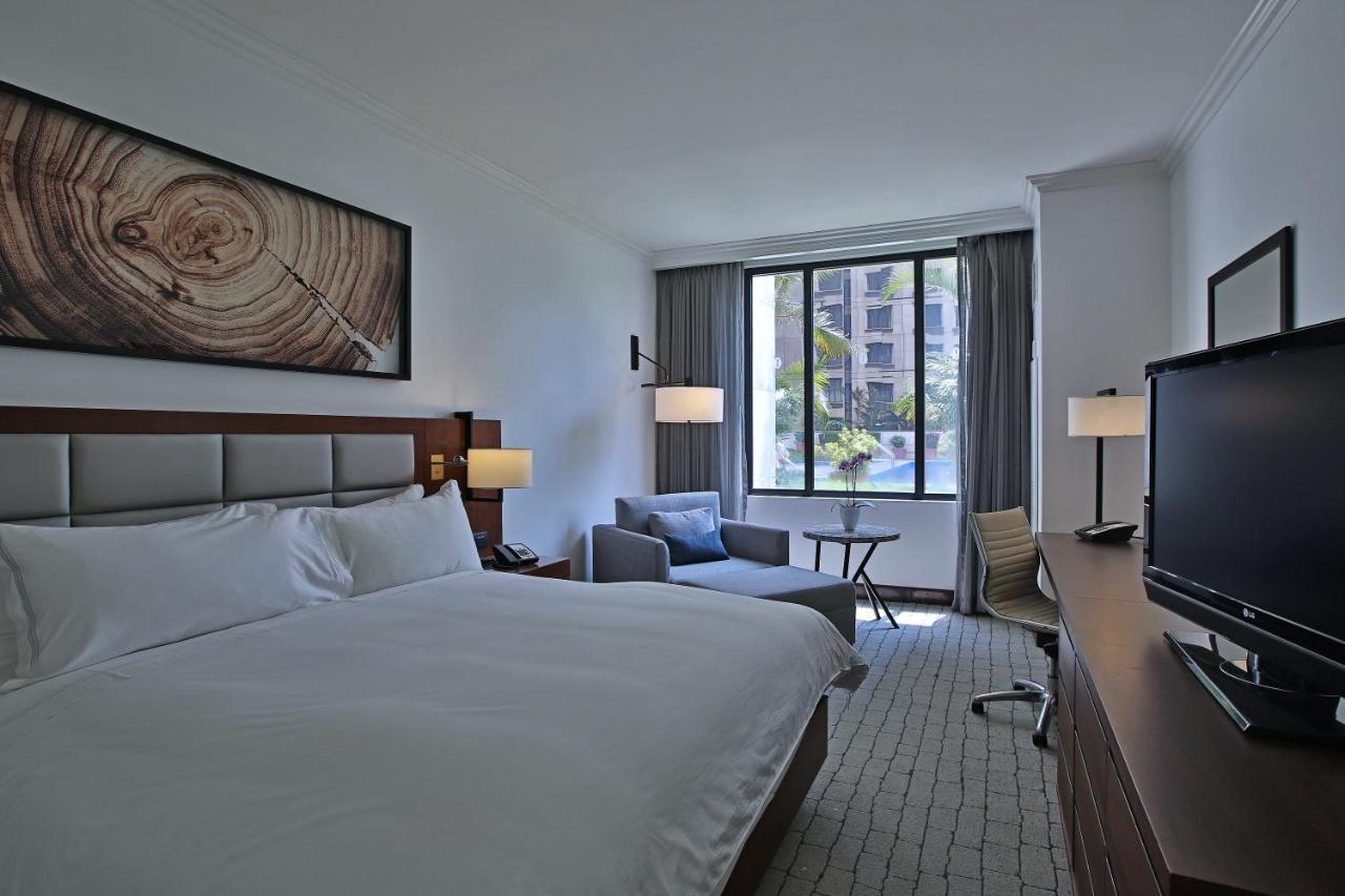 Habitación Clásica con cama extragrande y vistas a la ciudad