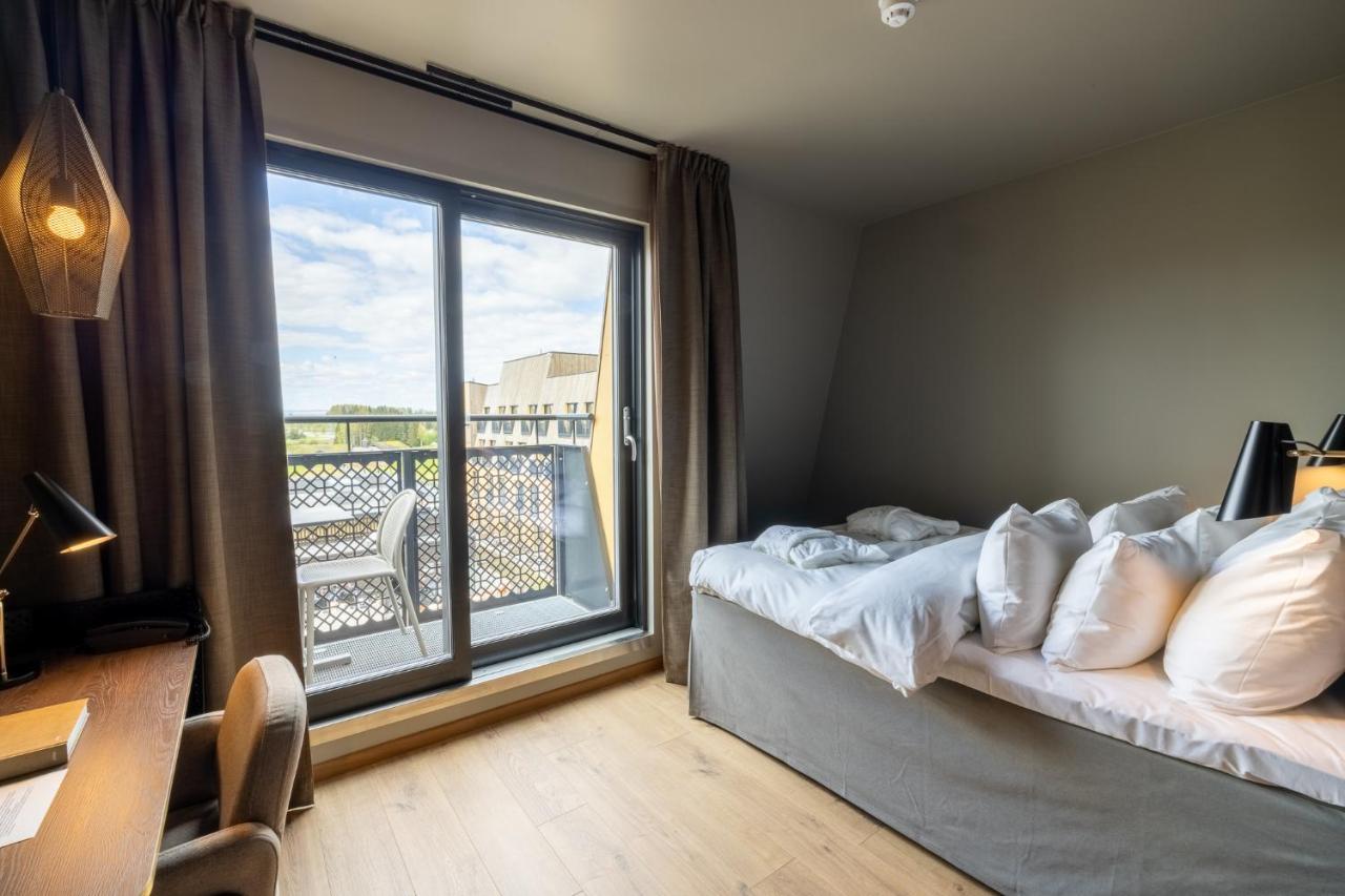 Kamer met Queensize Bed en Balkon
