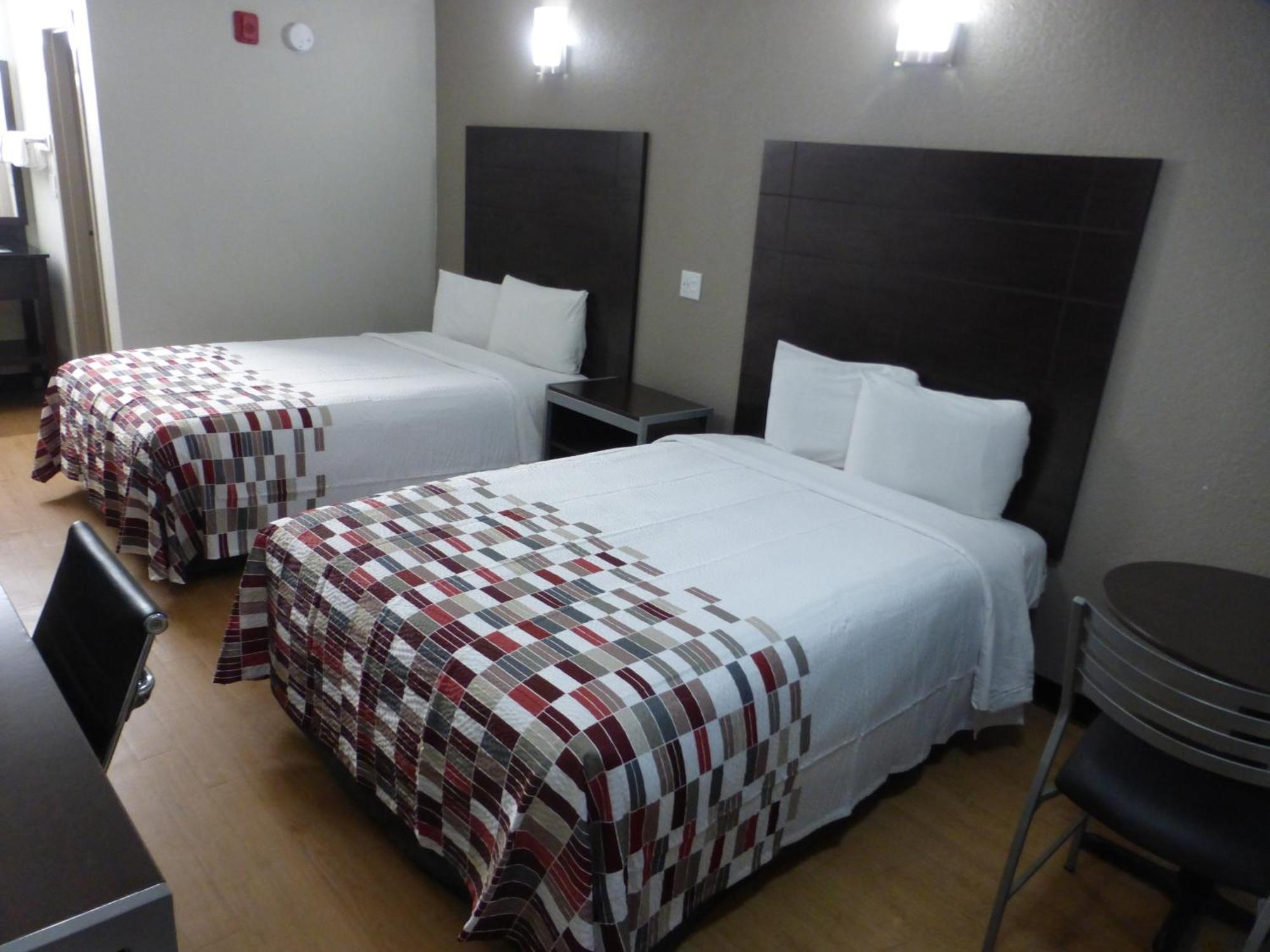 Deluxe Room Two Double Beds Smoke