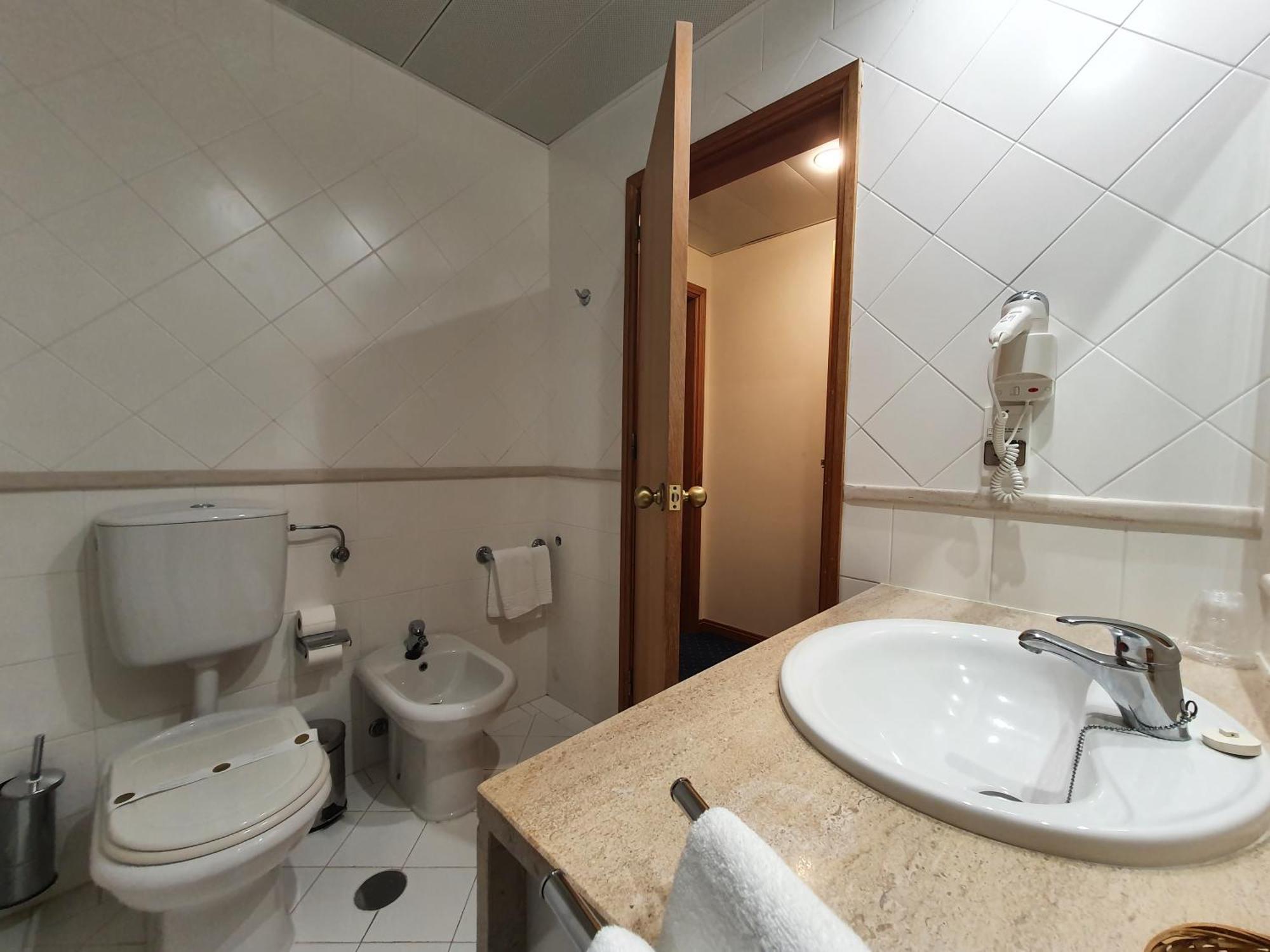 Quarto Duplo