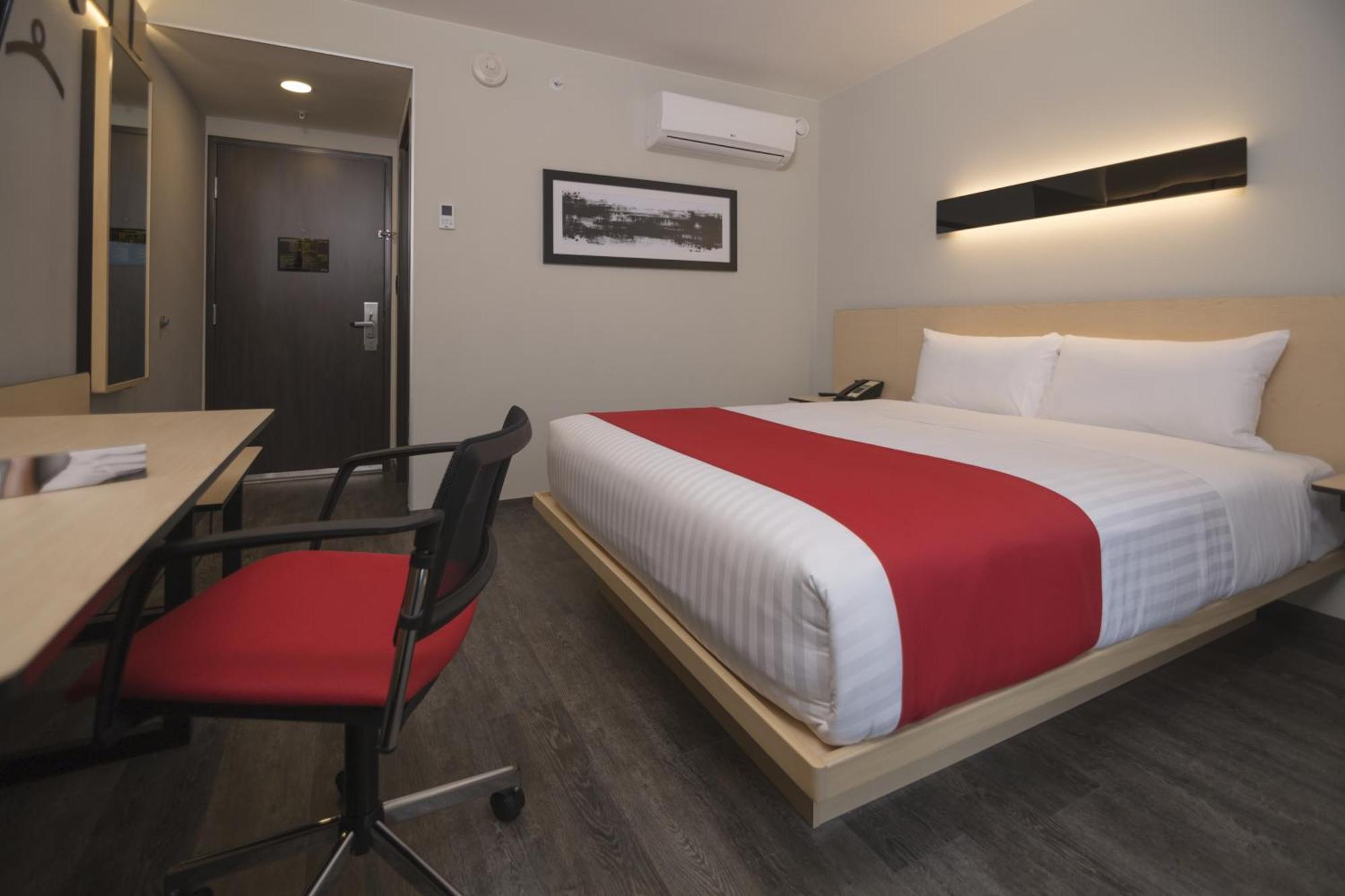 Habitación Doble Superior con sofá cama