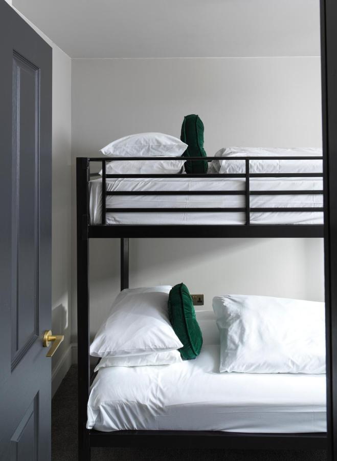 Two-Bedroom Apartment One Double Bed One Bunk Bed One Sofa Bed Kitchen