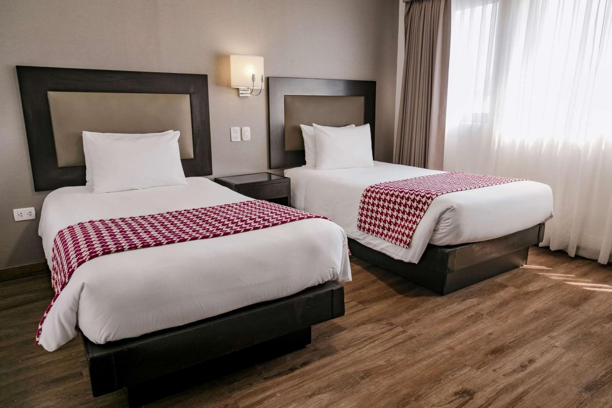 Family Suite with One Queen and Two Double Beds - Non-Smoking