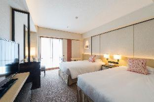 Quarto Twin Premium com Acesso ao Centro de Fitness - Não Fumador