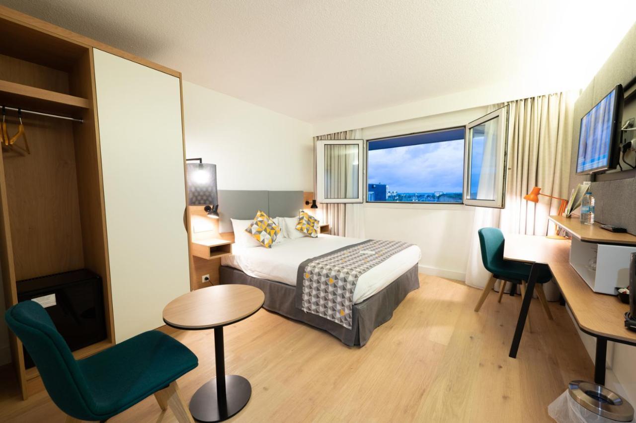 Standard Zimmer mit Queensize-Bett und Meerblick