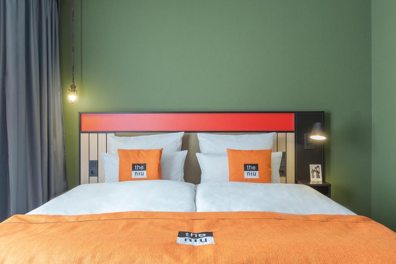 Premium Zimmer mit Queensize-Bett und Küchenzeile