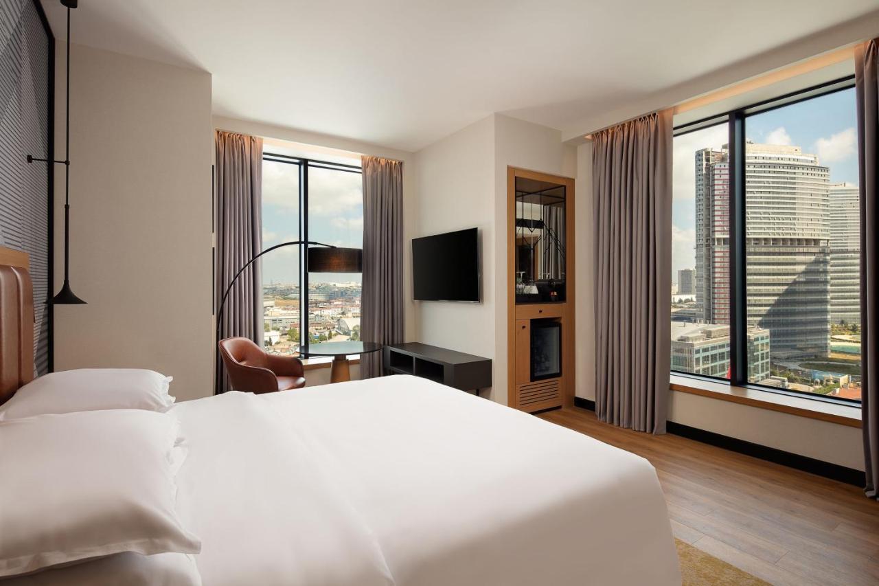 Executive Eckzimmer mit 2 Einzelbetten und Stadtblick - Zugang zur Club Lounge