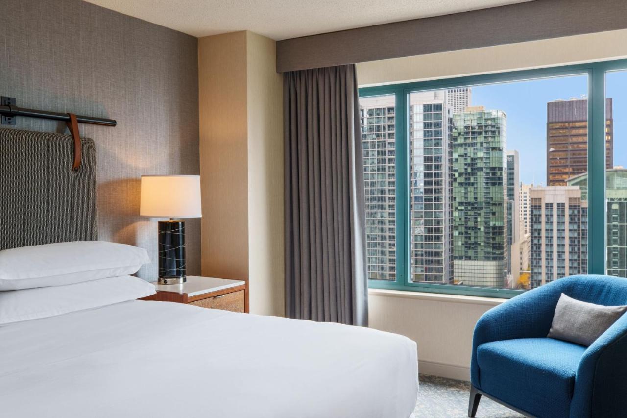 Suite Junior con sofá cama vistas a la ciudad - Cama extragrande