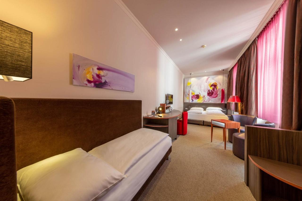 Deluxe Triple Room Garden View