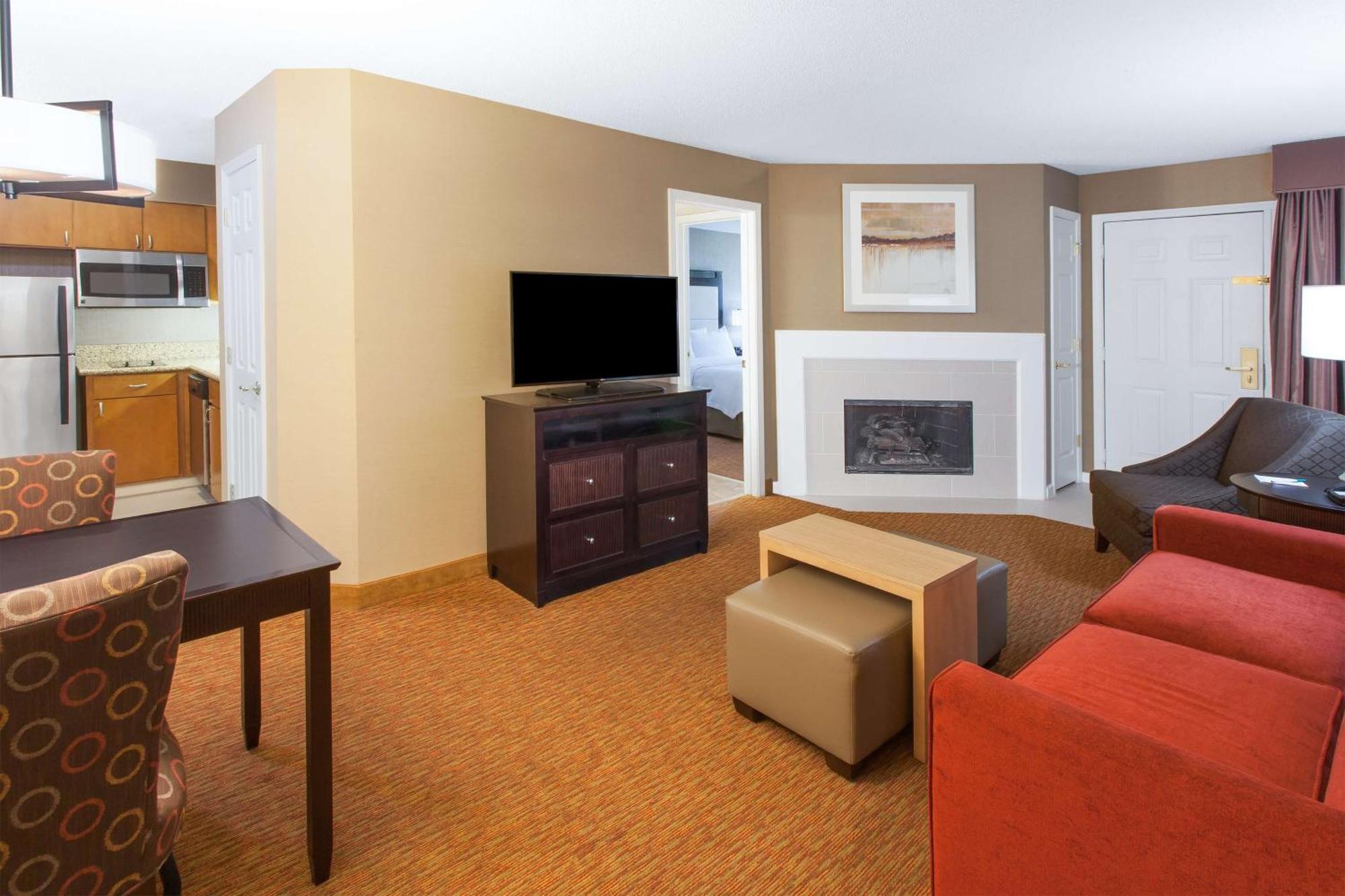 Two-Bedroom Suite with One King Bed & Two Double Beds