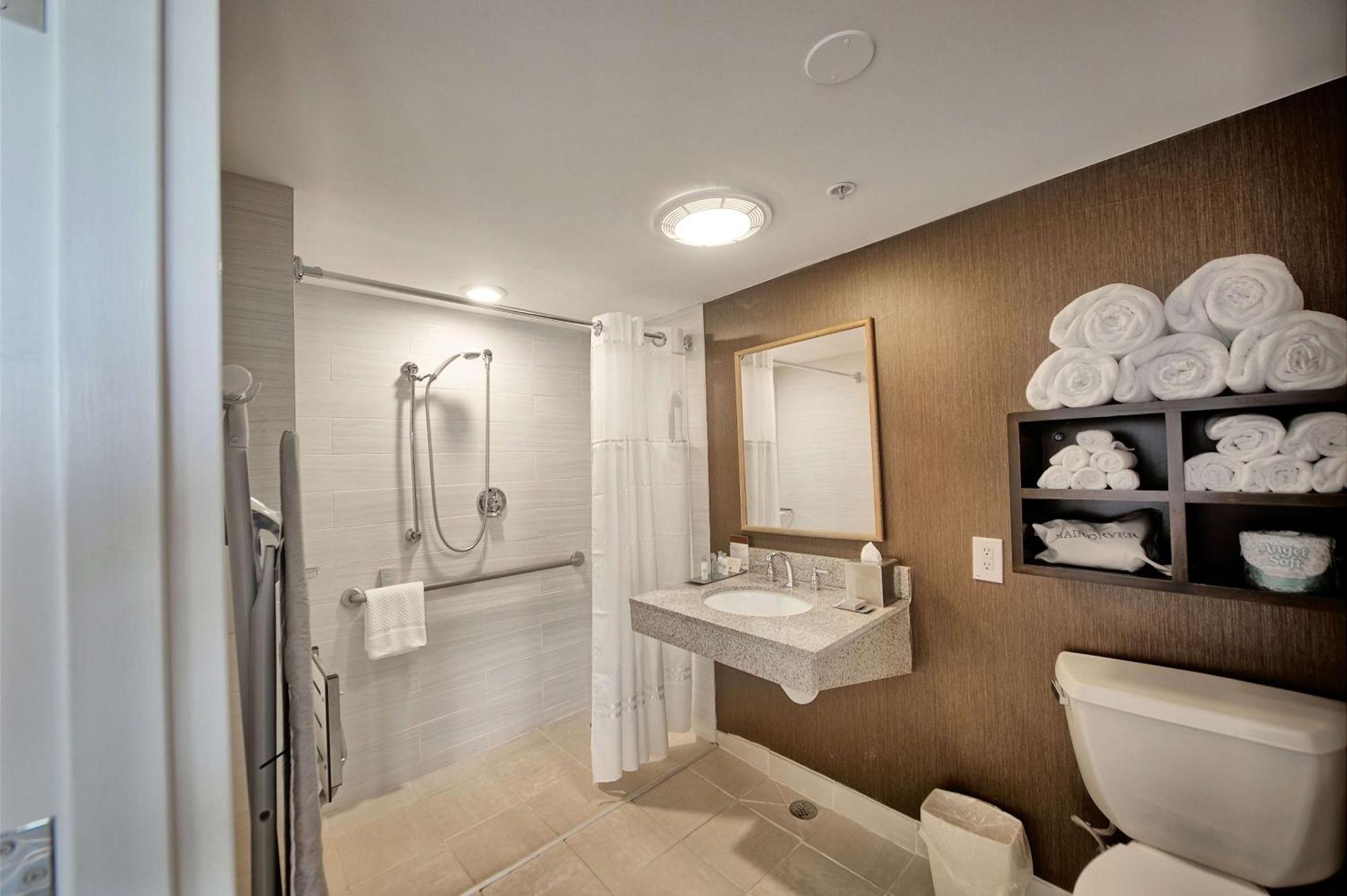 Queen Room Roll Shower Hearing or Mobility Accessible
