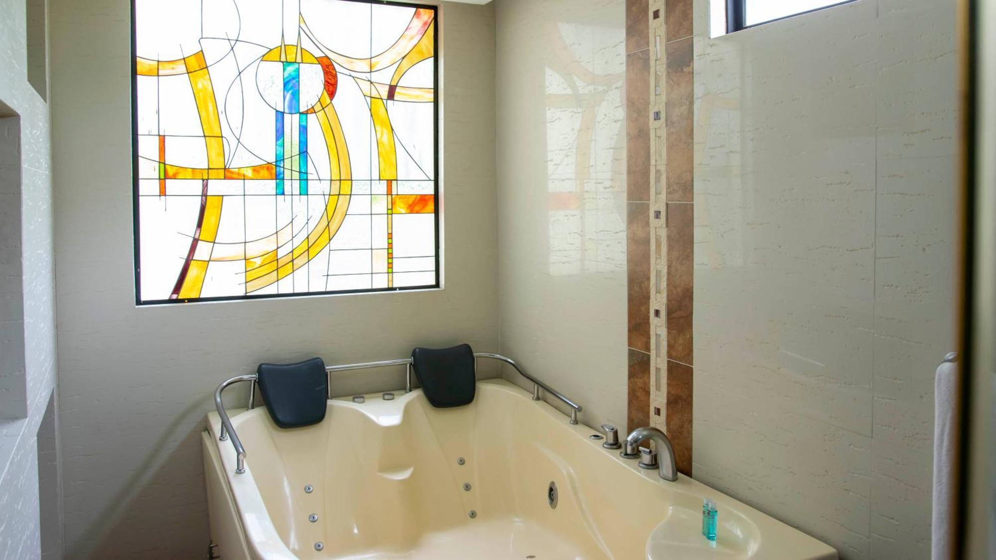 Suite con bañera de hidromasaje - Cama extragrande