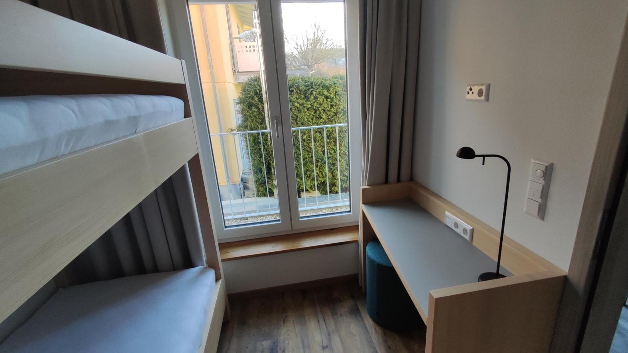 Familiensuite mit Balkon