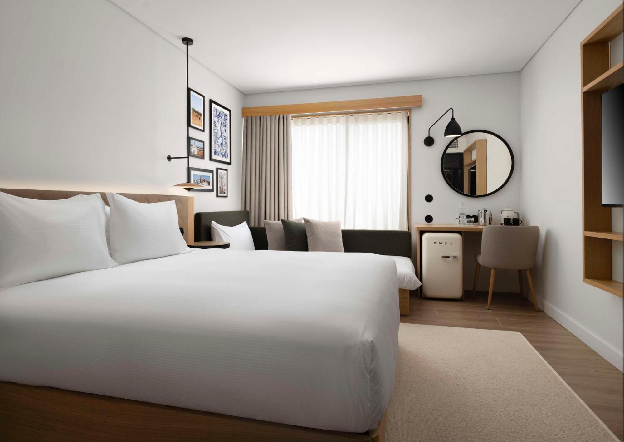 Quarto King Premium com Vista Panorâmica e Sofá-cama