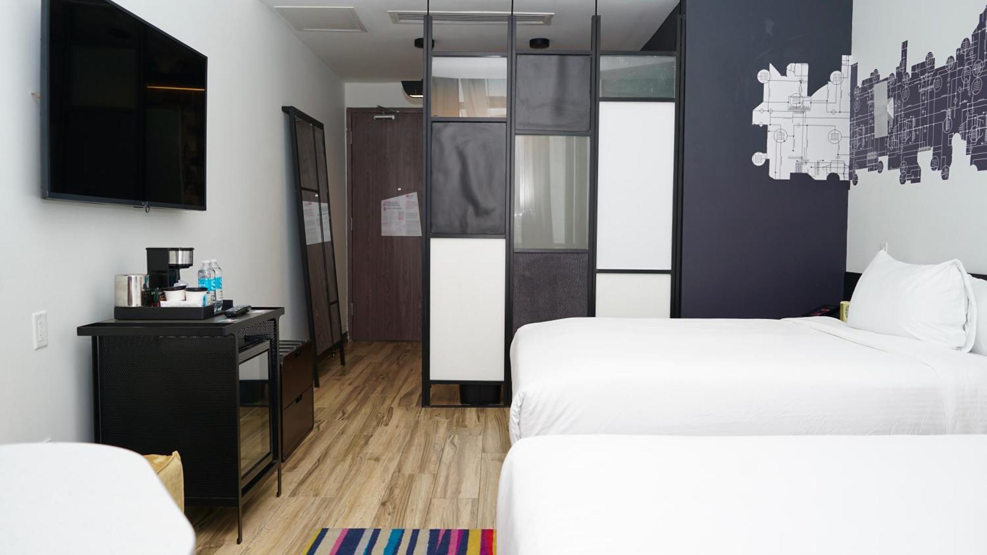 Guest Room Two Queen Beds Balcony
