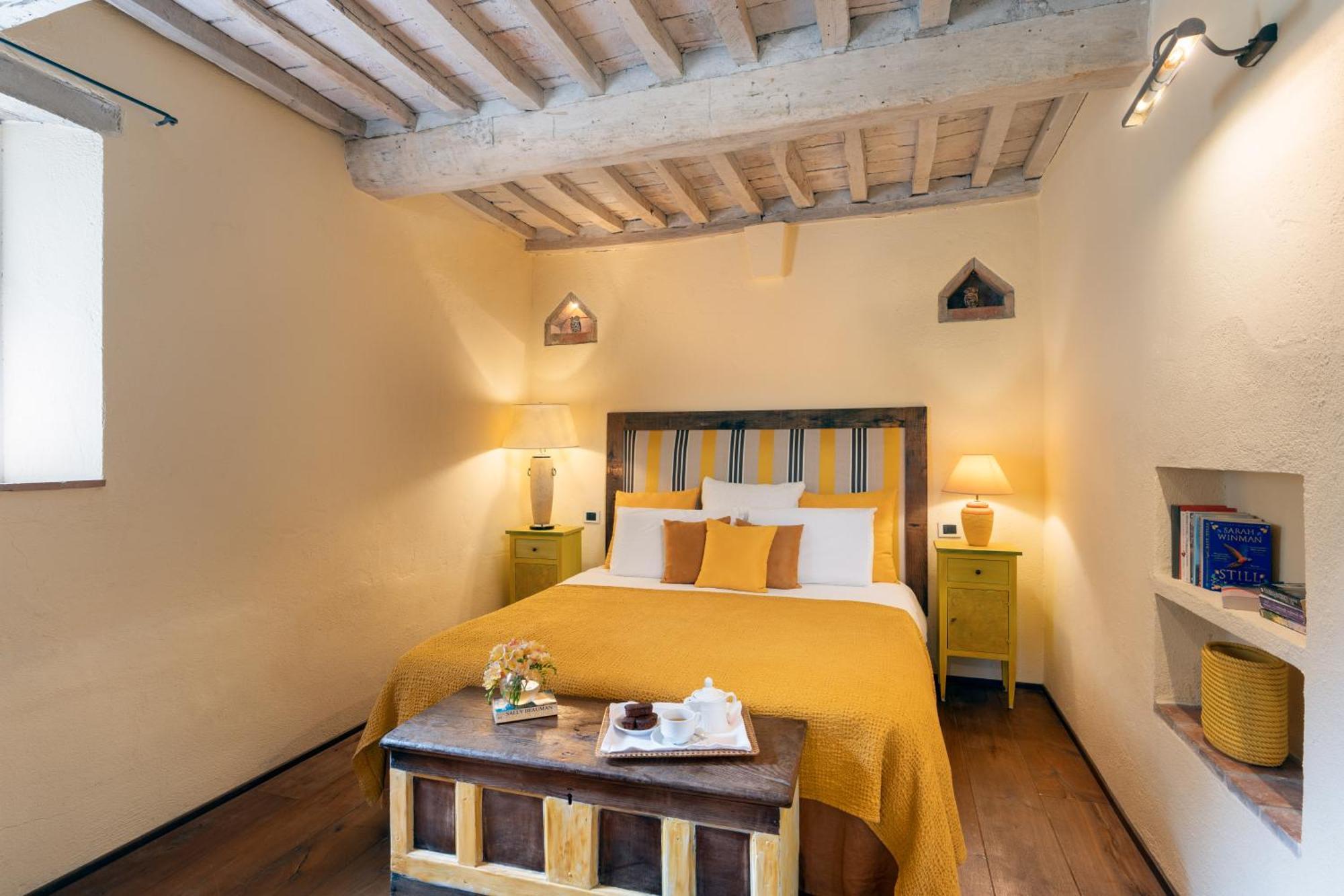 Camera Familiare con Bagno in Comune (2 Adulti + 2 Bambini)