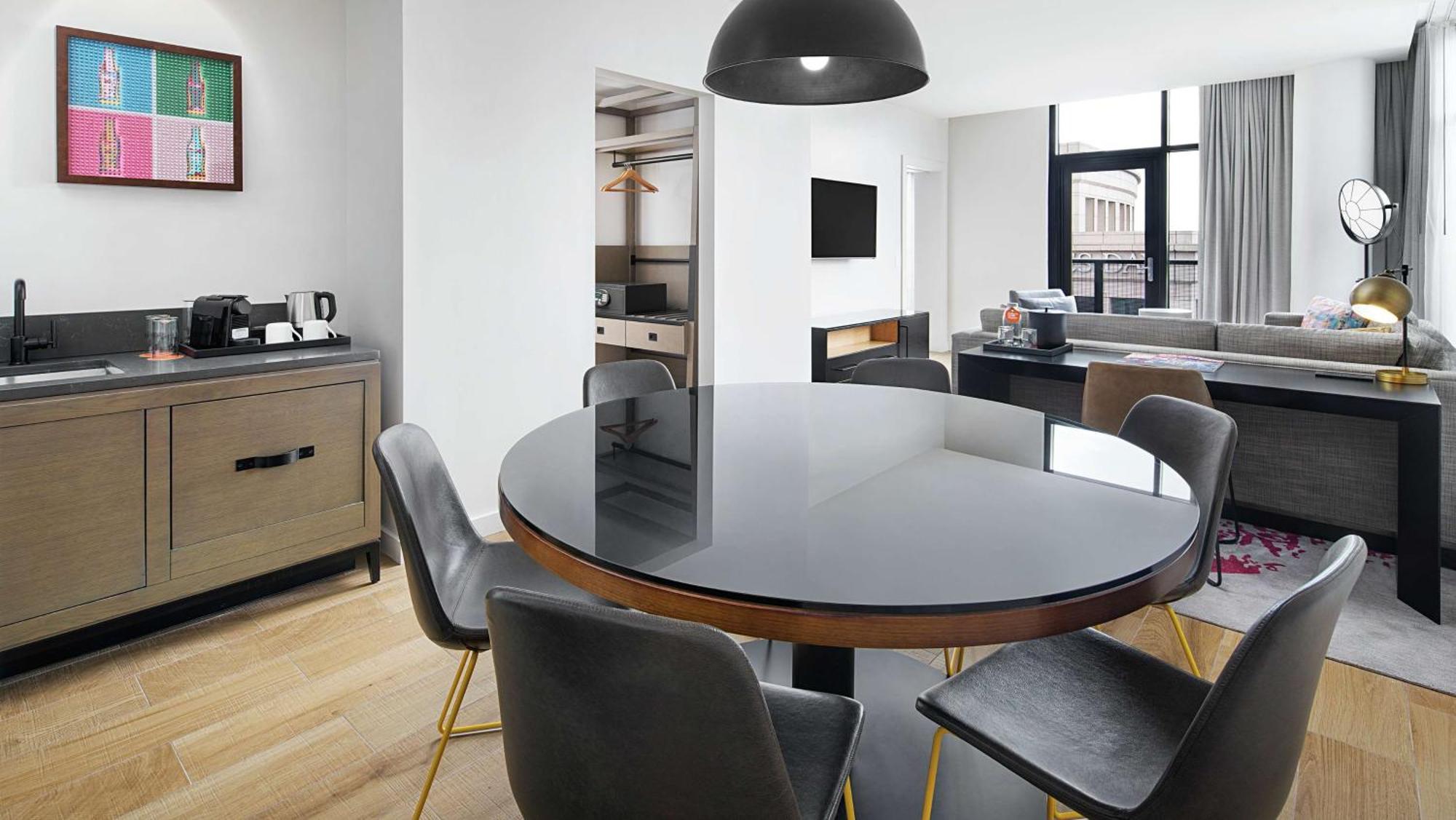 One-Bedroom King Suite with Balcony and City View