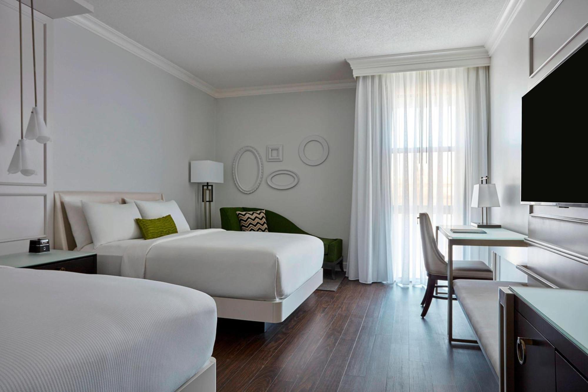 Kamer met 2 Queensize Bedden