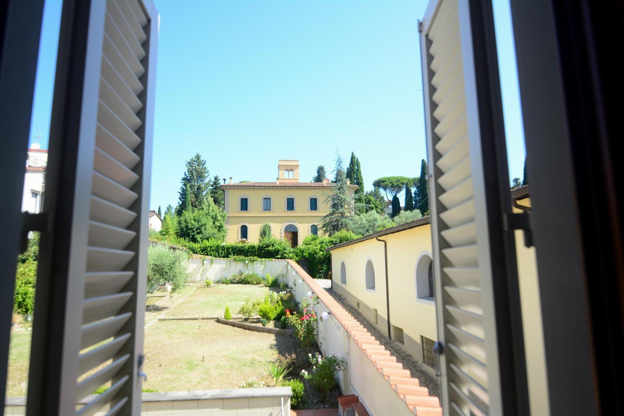 Camera Matrimoniale/Doppia con Letti Singoli con Vista Giardino