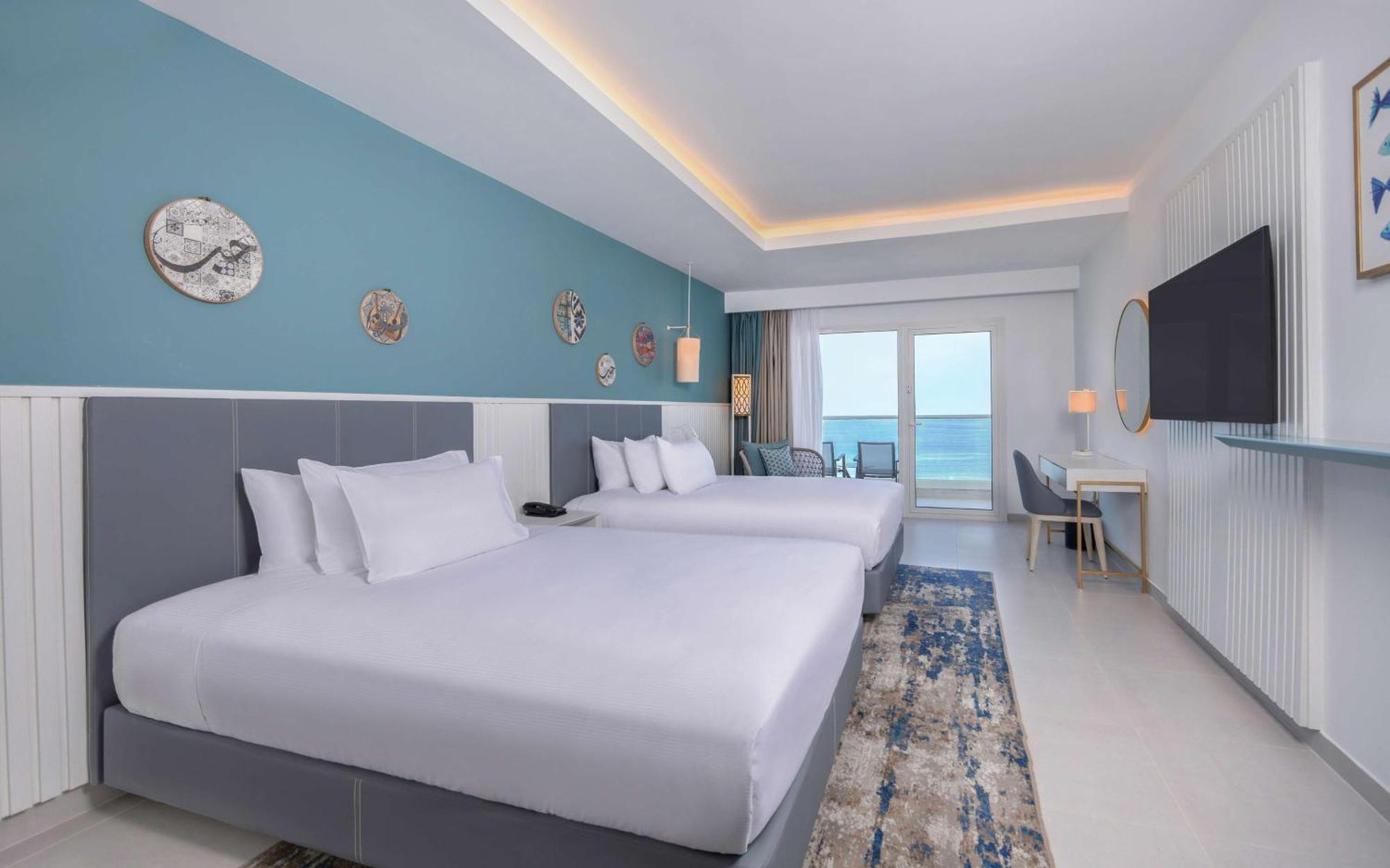 One-Bedroom Queen Suite Two Queen Beds Front Sea View,1774924614:JPEG