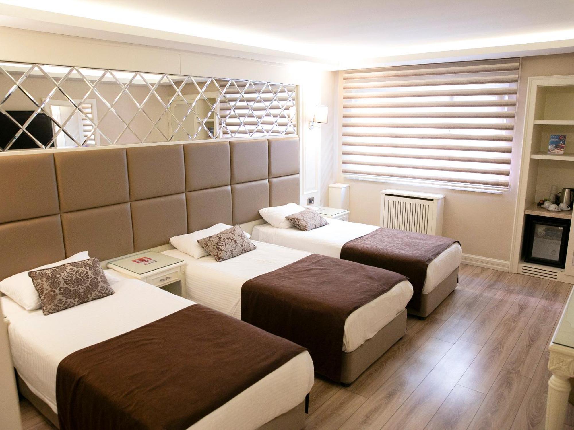 Deluxe Triple Room