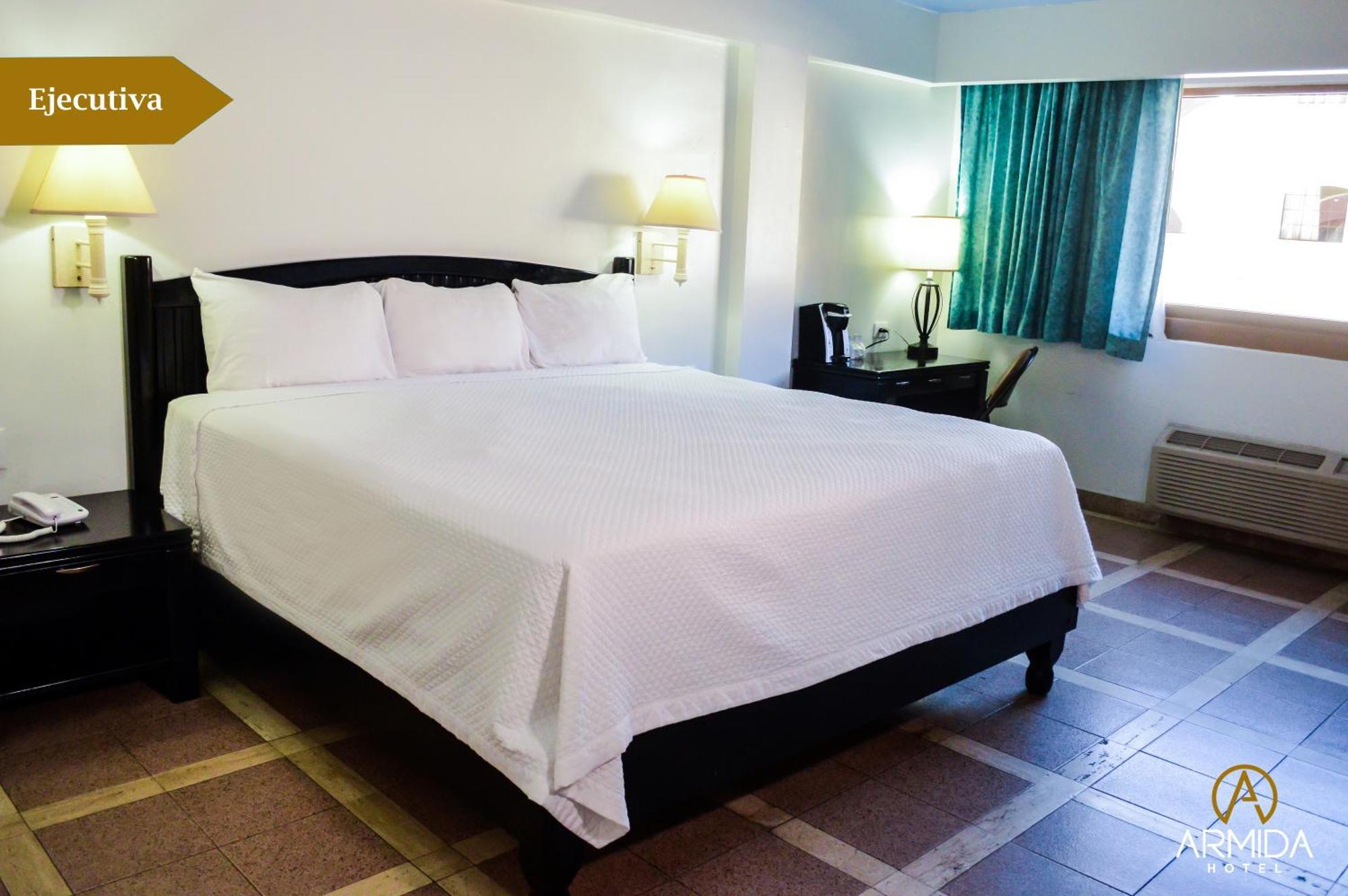 Habitación con cama extragrande.