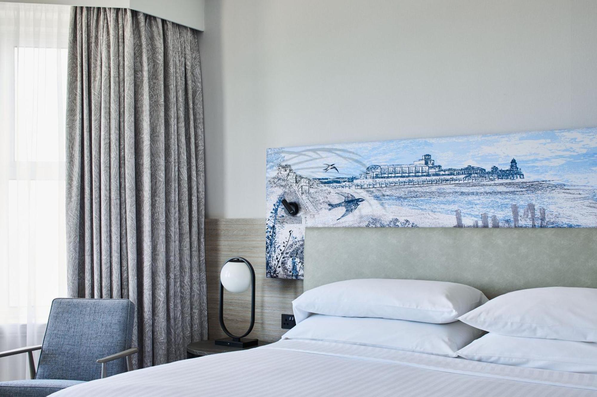 One-Bedroom King Suite with Sofa Bed and Sea View