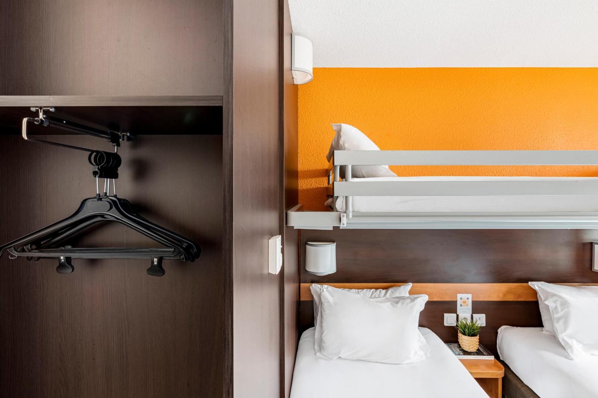 2 side-by-side Triple Rooms