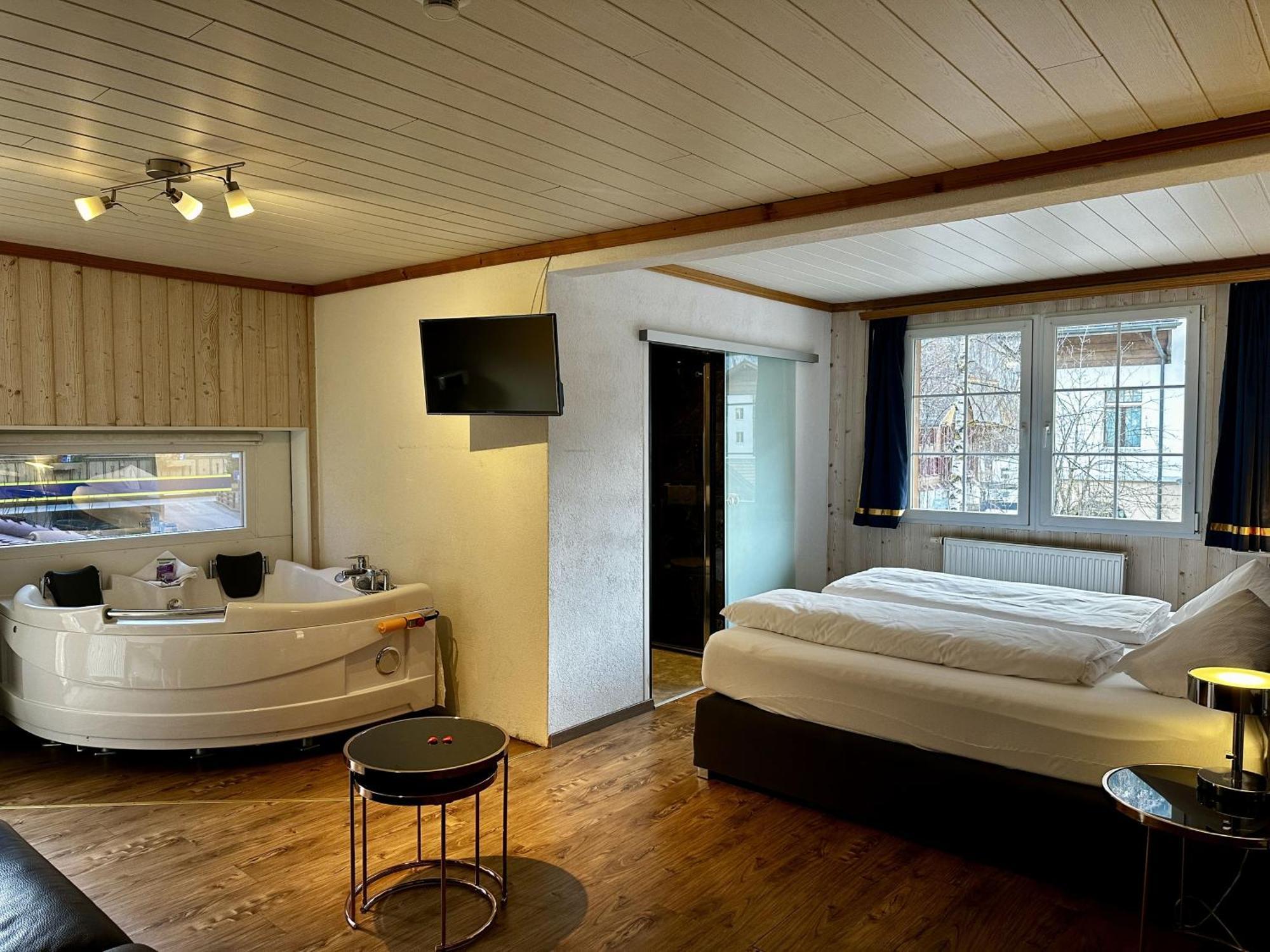 Chambre Lit King-Size avec Baignoire Spa