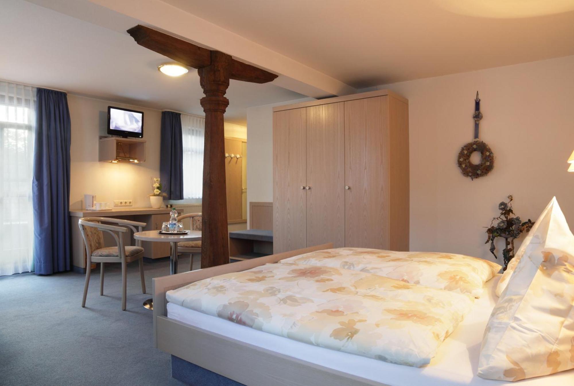 Dreibettzimmer mit Balkon