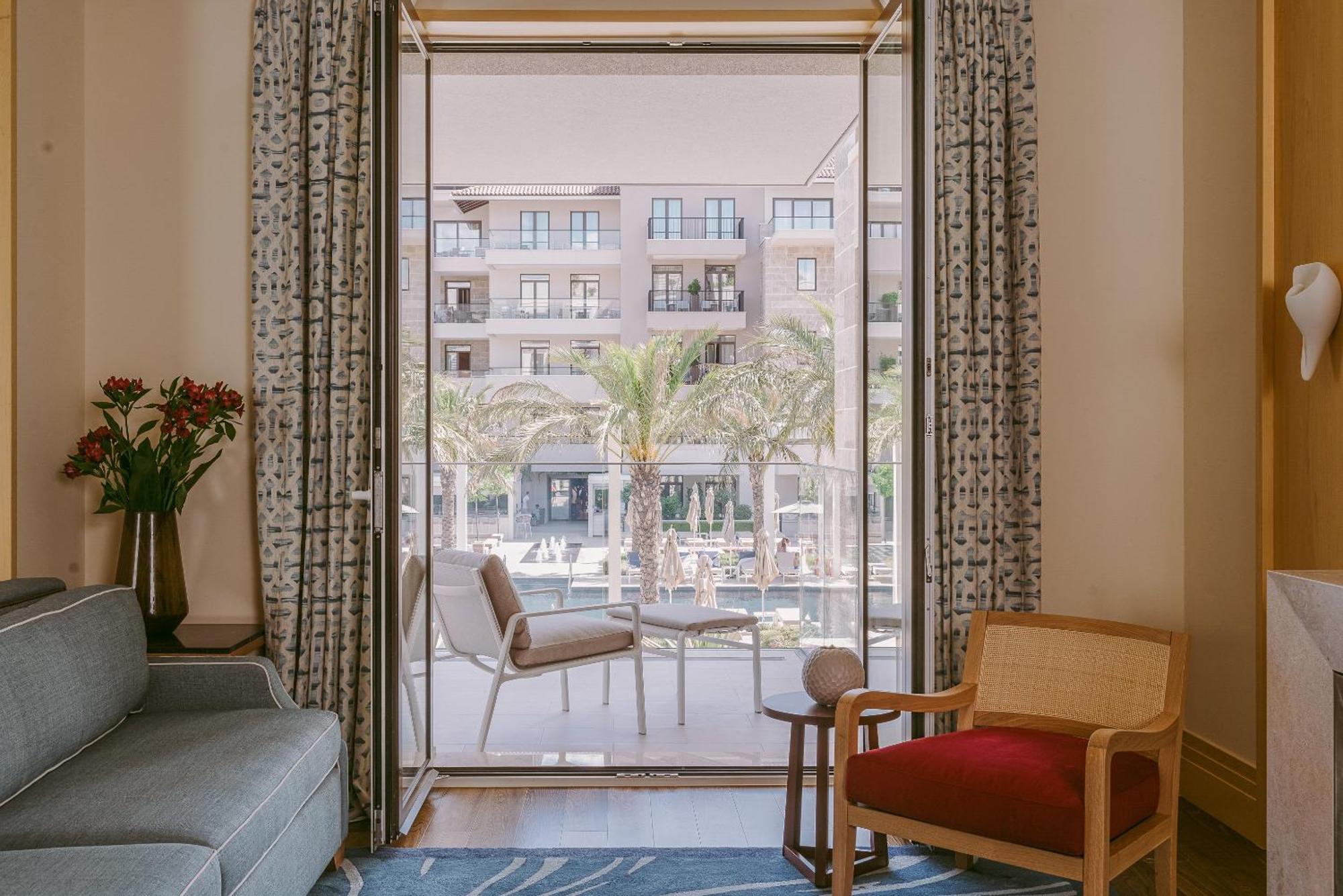 King Studio Suite with Balcony and Pool View