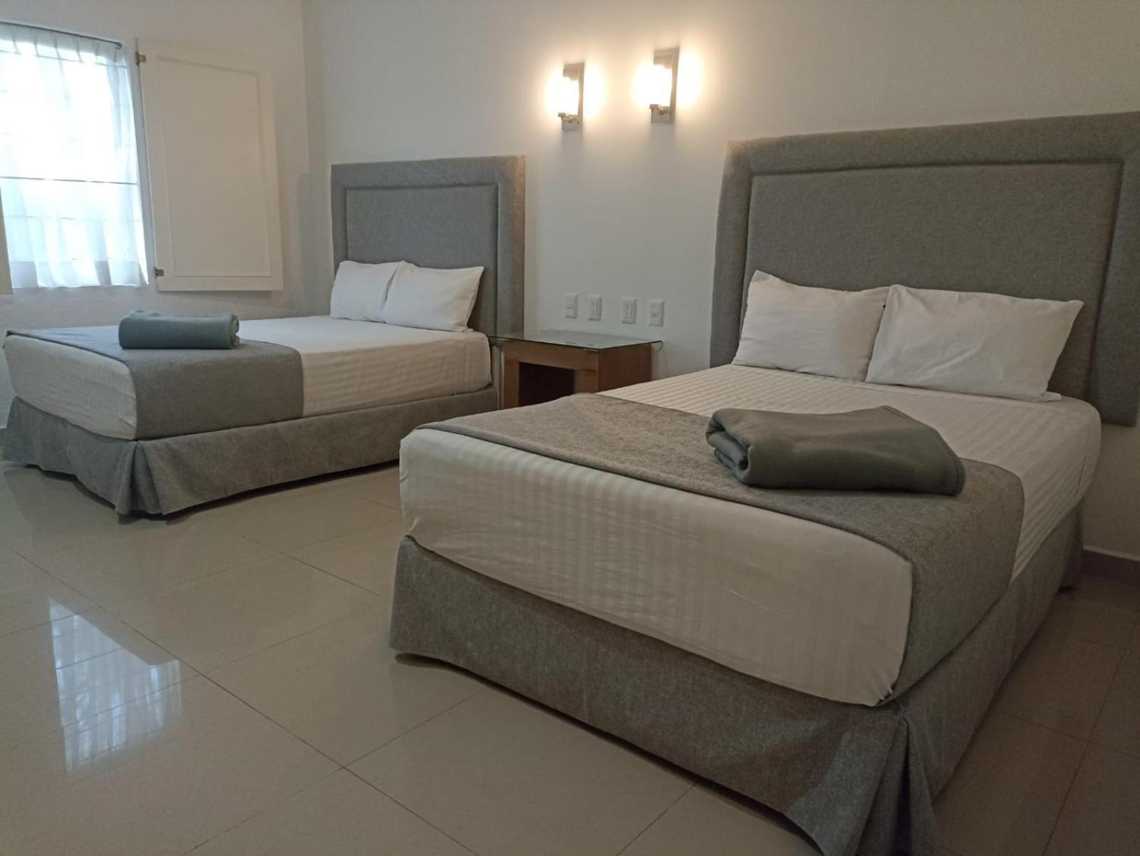 Habitación Doble Estándar con 2 camas dobles