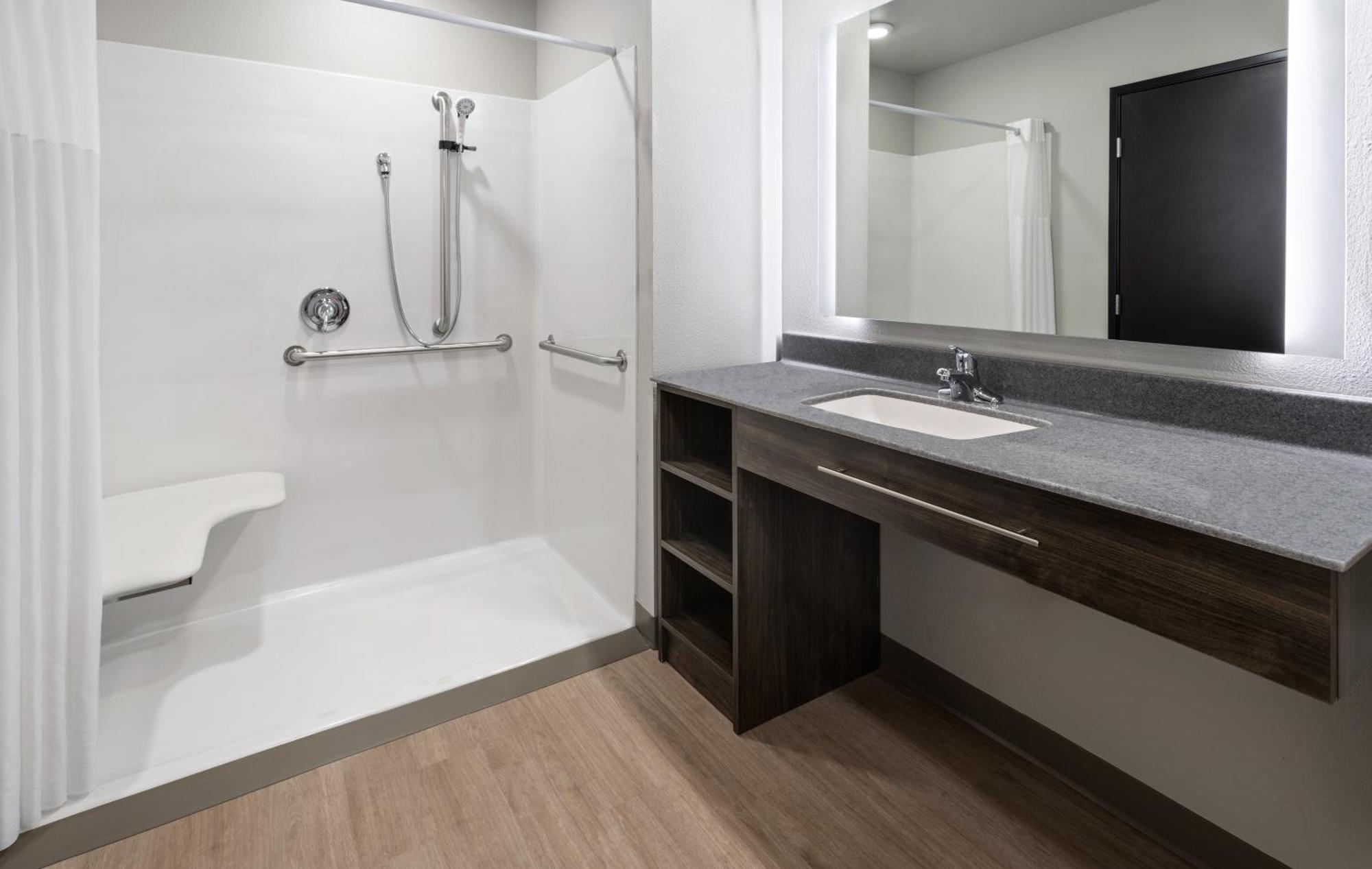 King Room Recliner Hearing & Mobility Accessible Roll Shower,1652808154:JPEG
