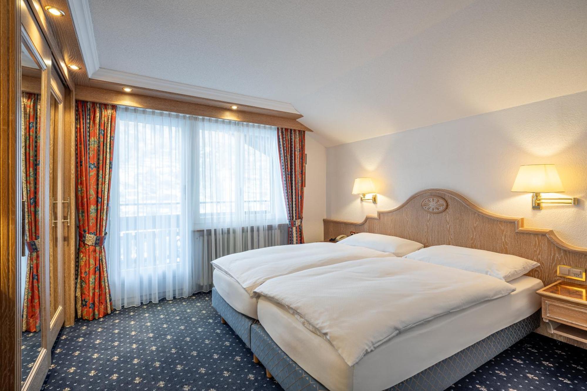 Deluxe Double Room Matterhorn View Balcony or Ground Floor Terrace
