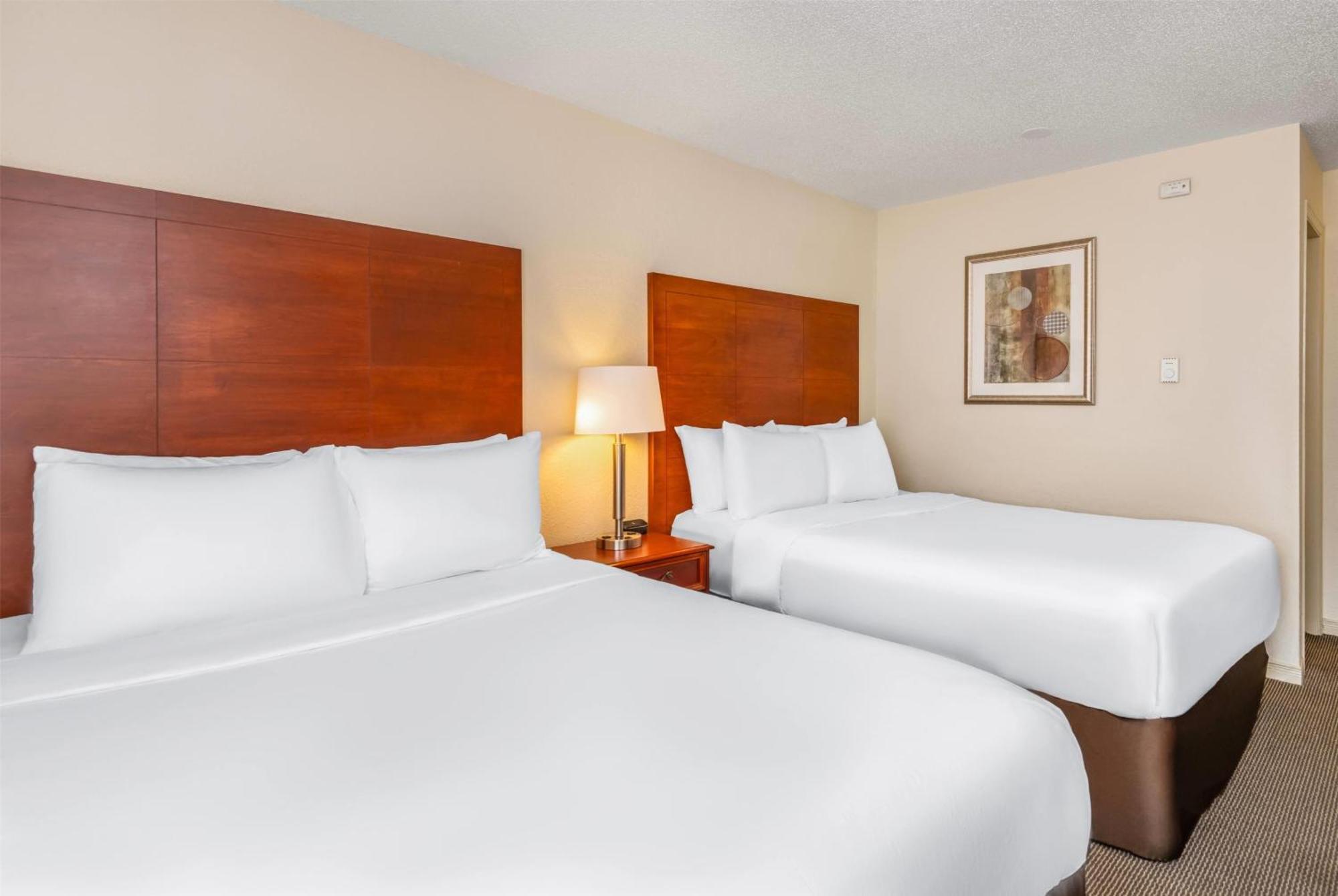 Queen Room Two Queen Beds Pool View Non-Smoking