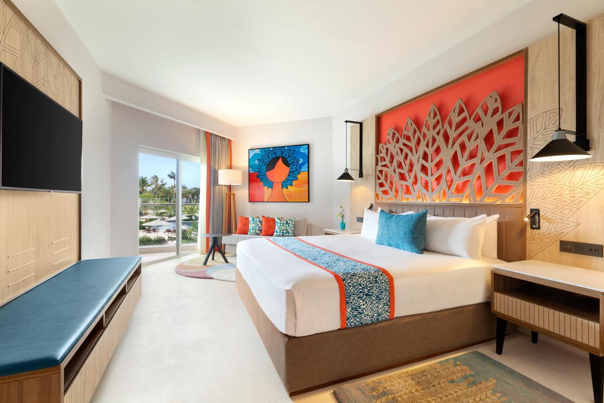 Deluxe Partial Ocean View 1 King Bed