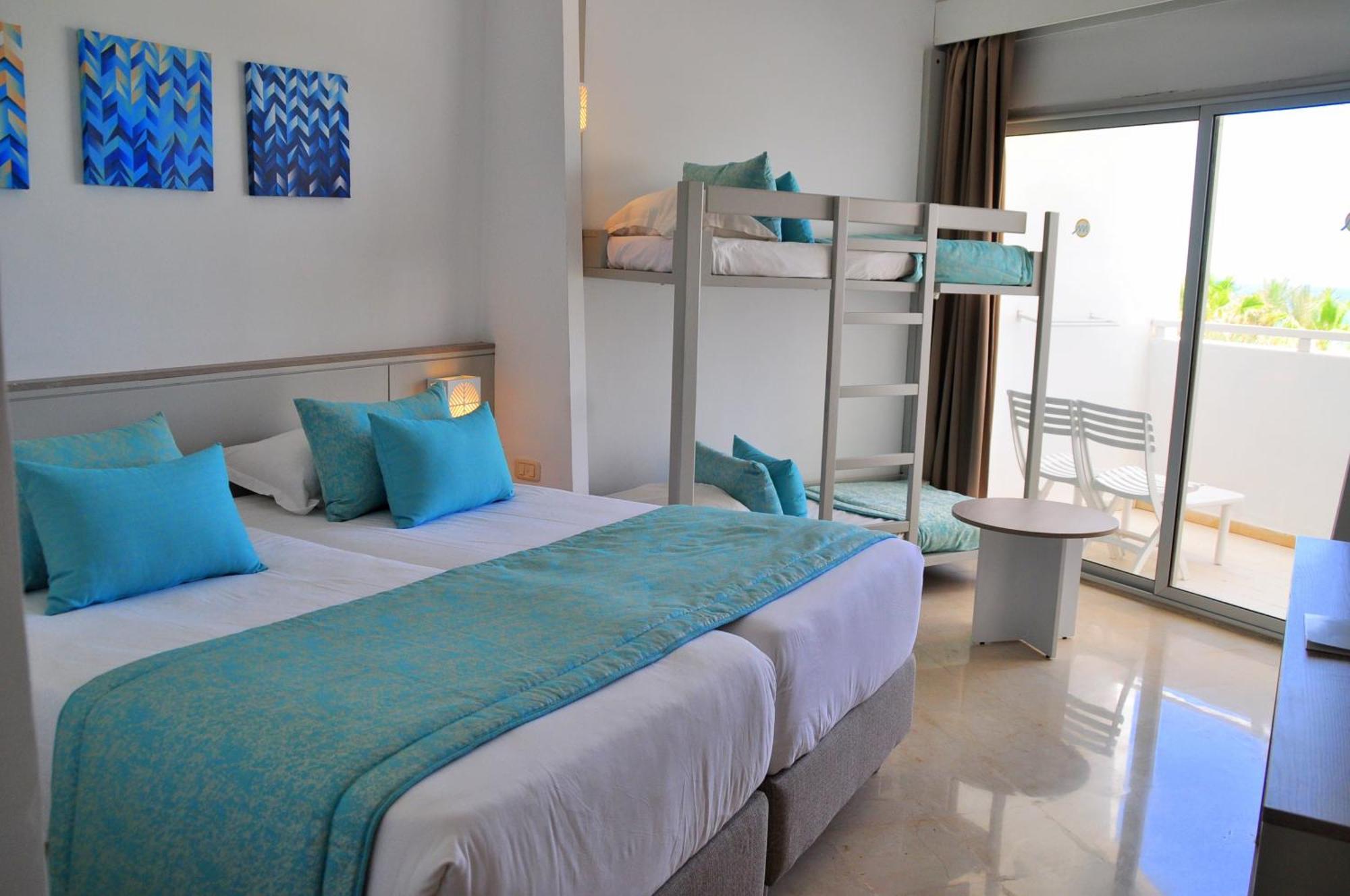 Quarto Quádruplo com Vista Jardim