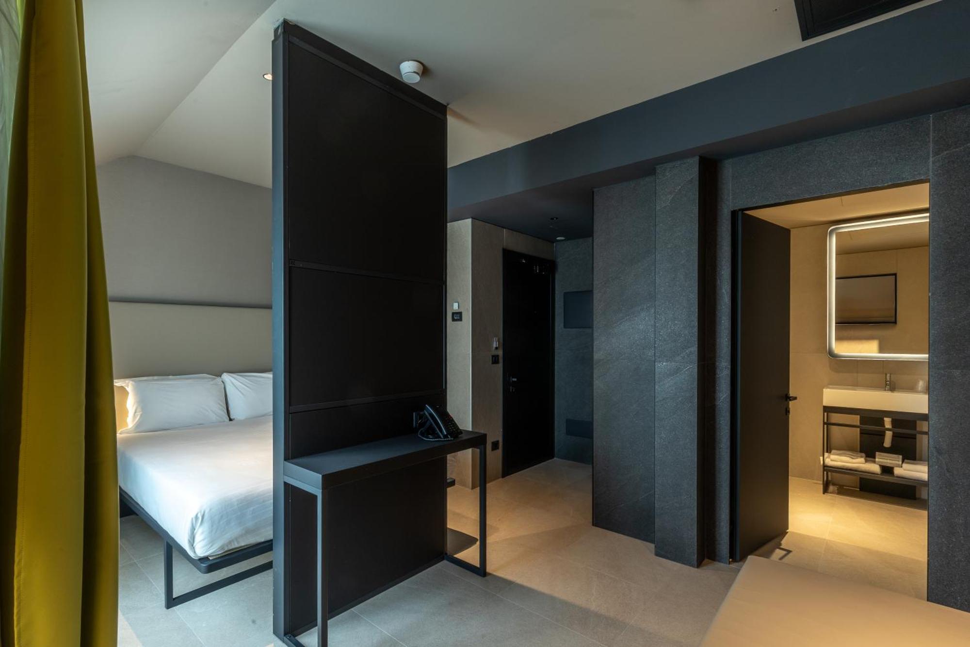 Chambre Double Supérieure avec Balcon - Vue sur Ville