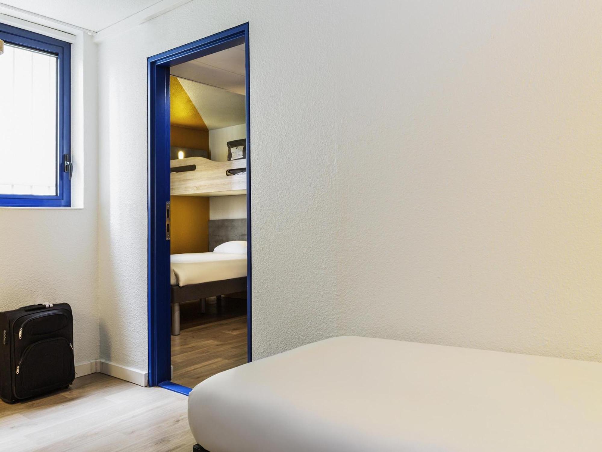 Family Double Room with One Double Bed and Two Single Beds