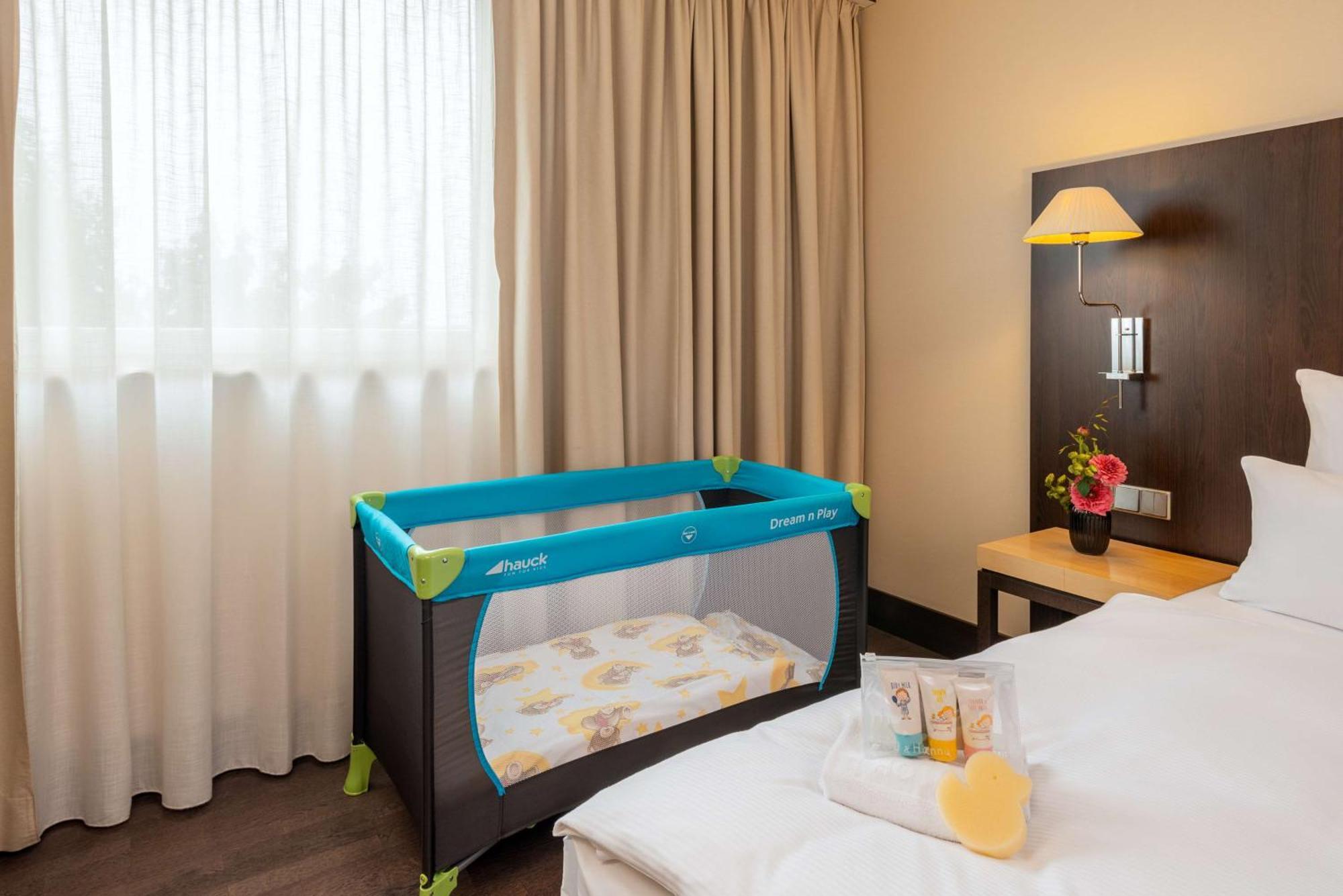 Standaard Kamer met Extra Bed (2 Volwassenen + 1 Kind)