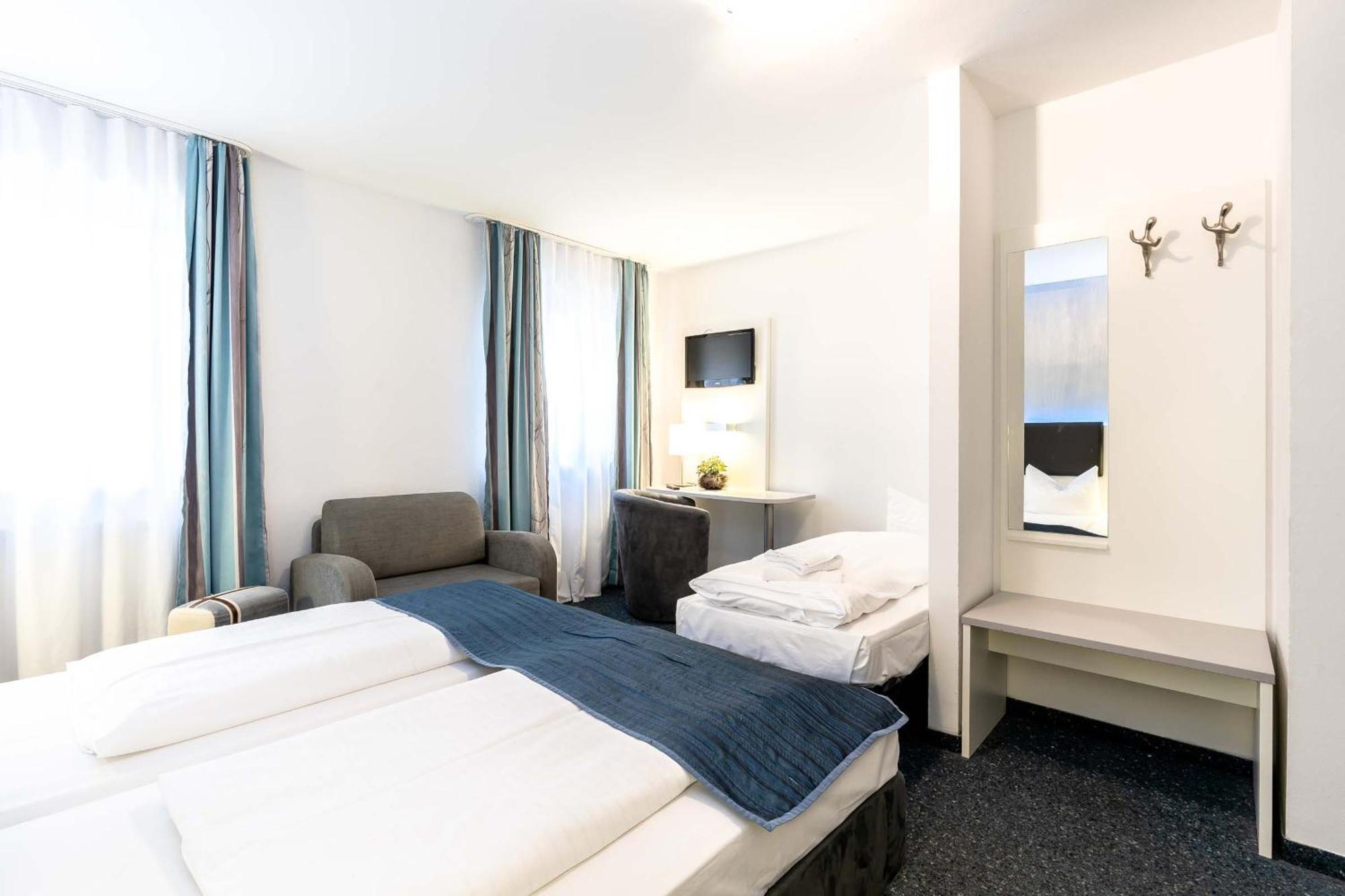 Dreibettzimmer