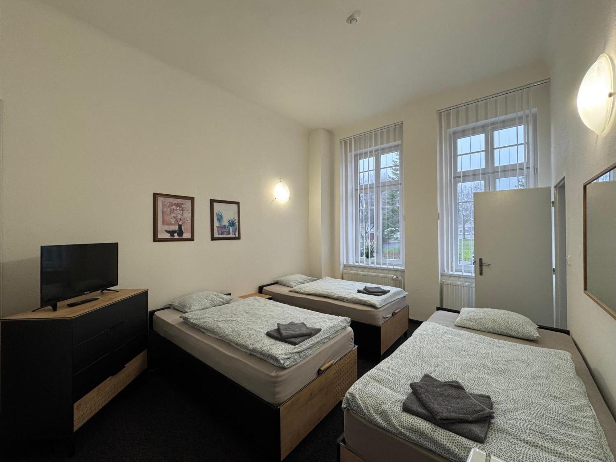 Dreibettzimmer mit eigenem Bad