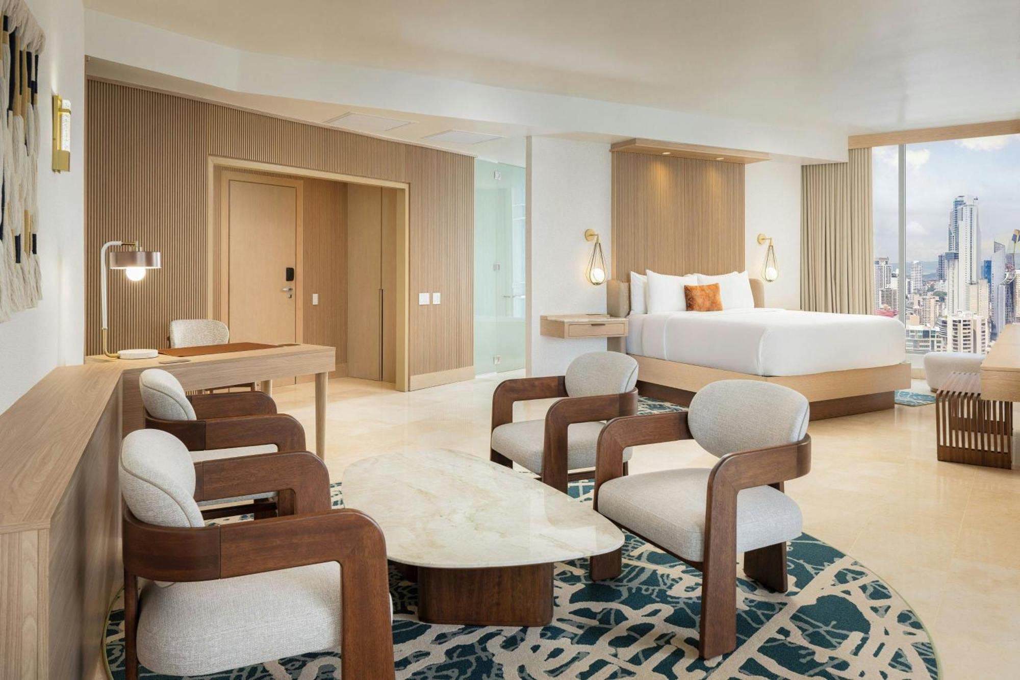 Executive suite king bed balcony partial ocean view