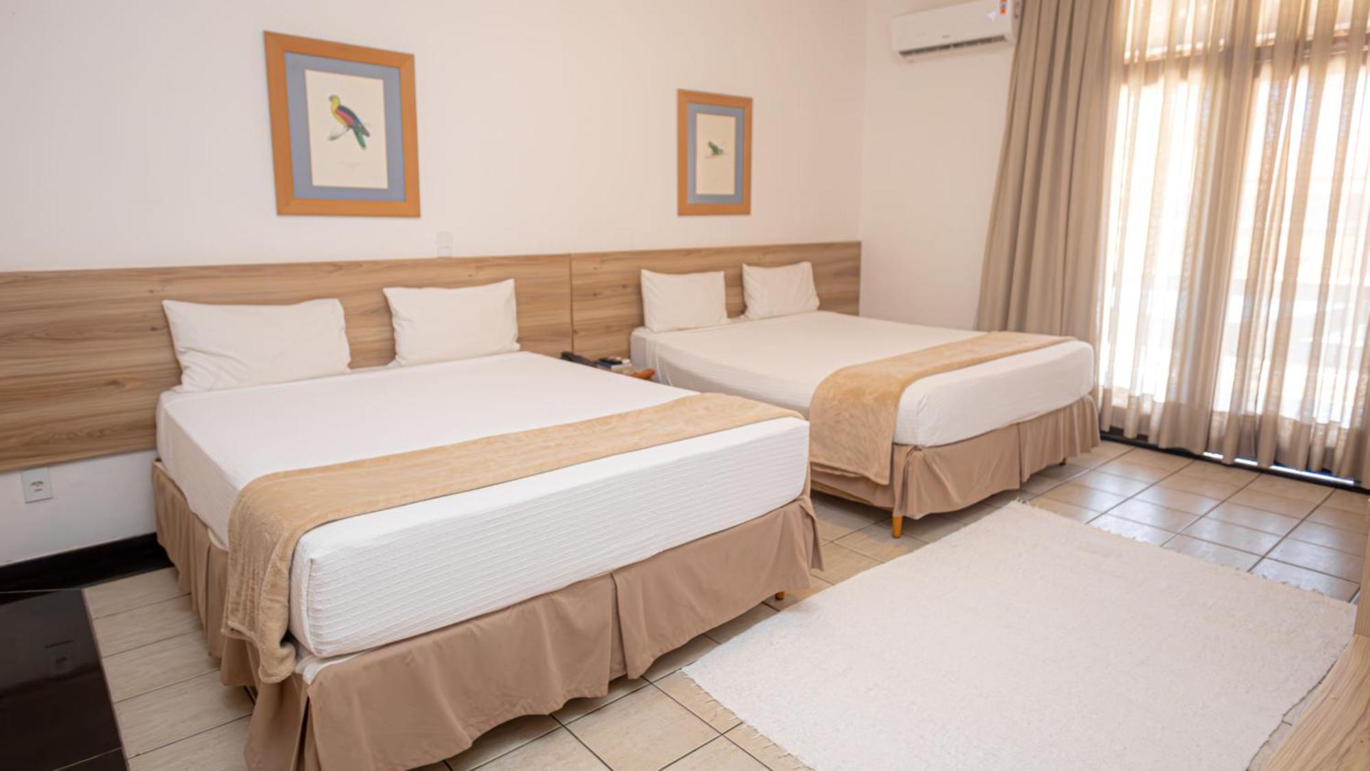 Quarto Duplo com Vista Piscina