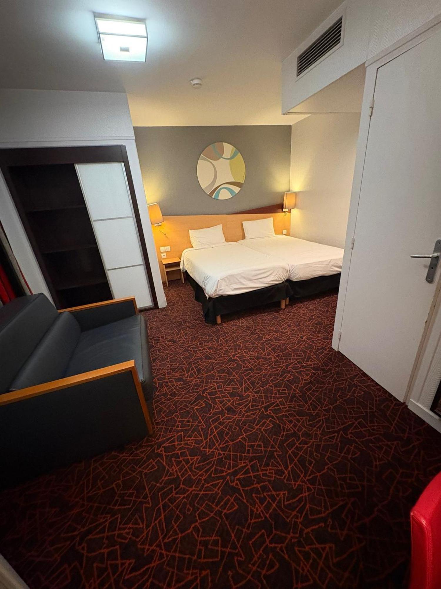Standard Room 2 Single Beds 1 Sofa Bed